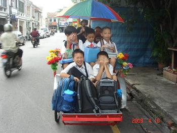trishaw in penang with kids.jpg